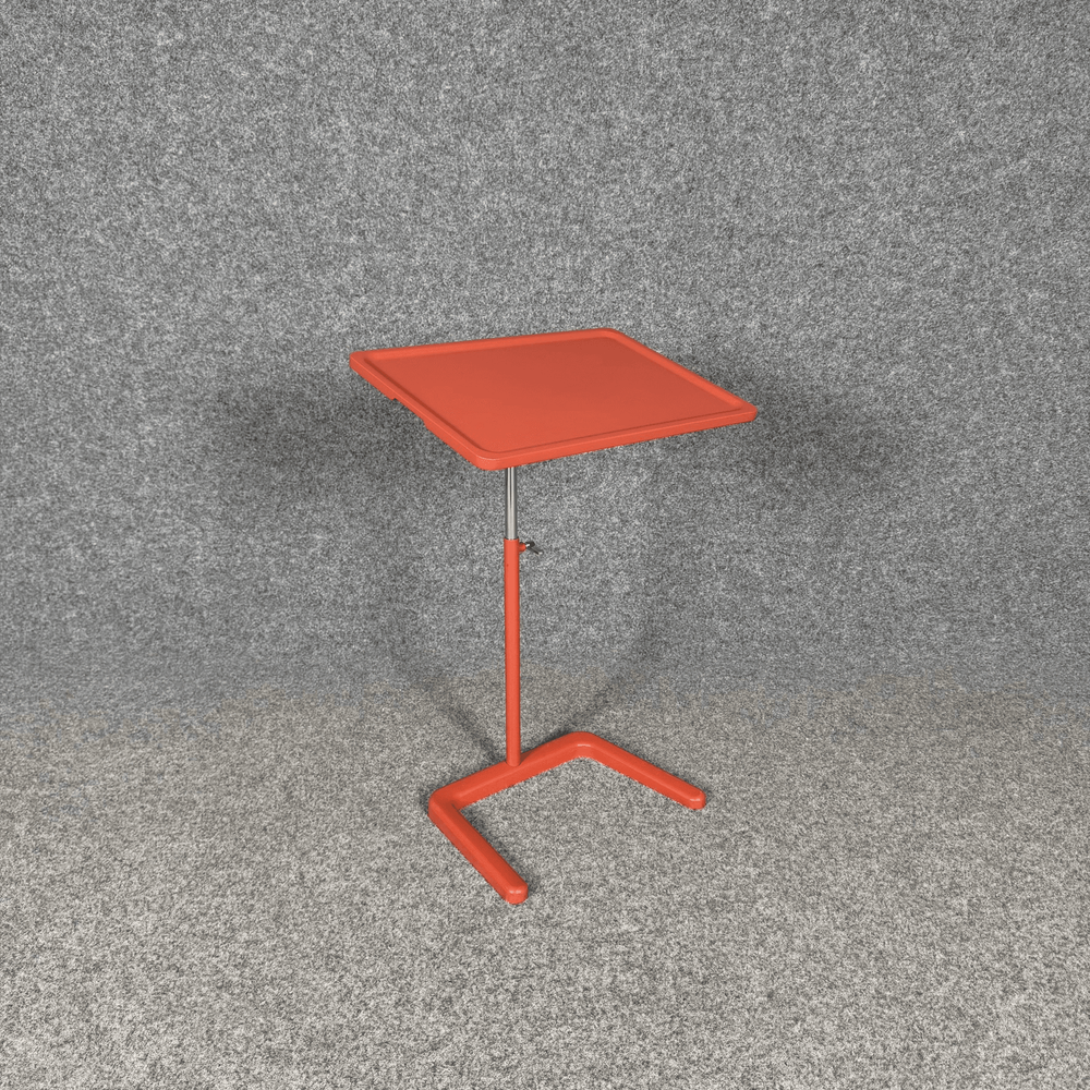 Begagnat laptopbord NesTable från Vitra i orange. Mått: bredd 50 cm, djup 35 cm och höjd 57 - 77 cm. 