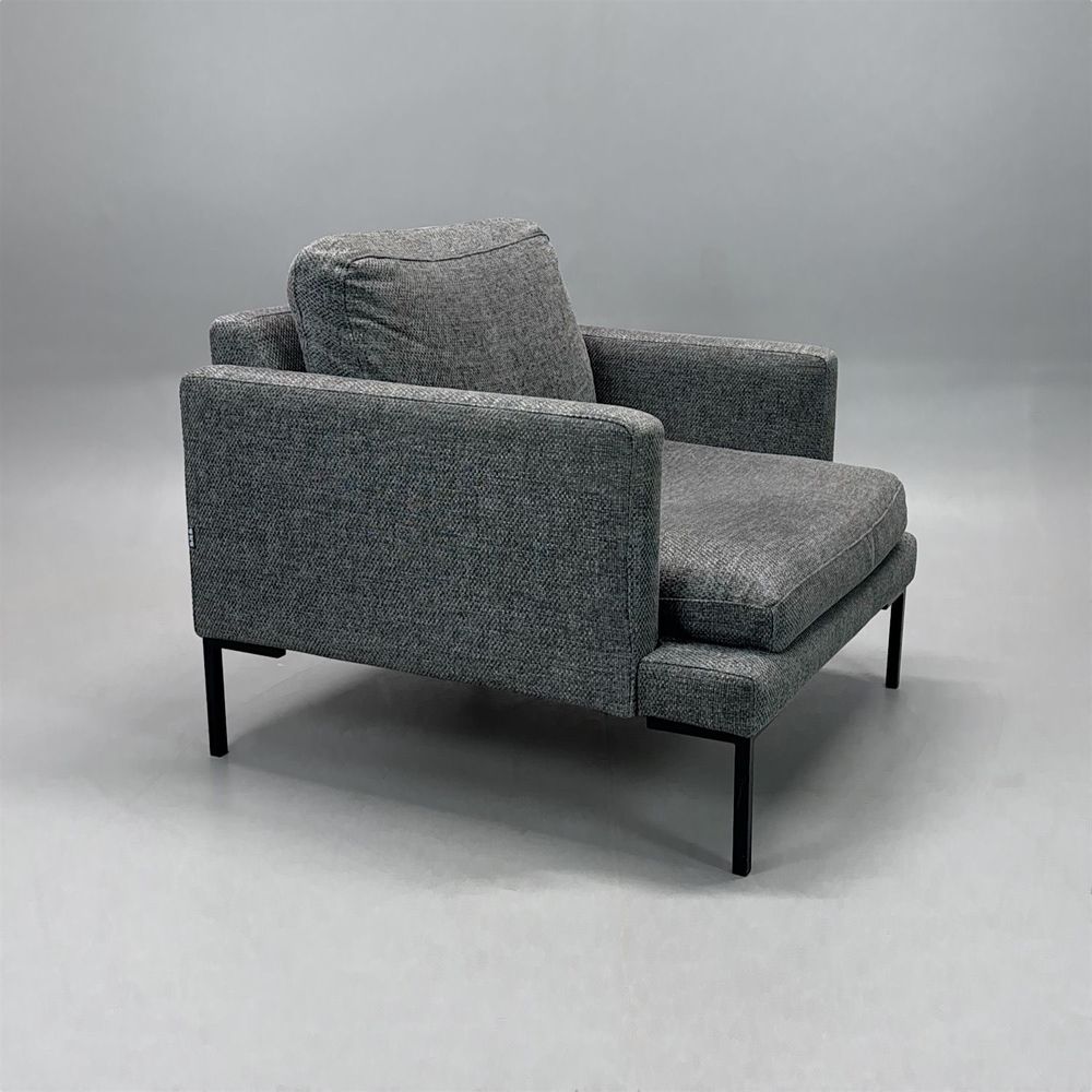 Begagnad fåtölj Impulse från Sits klädd i grått tyg. Mått: Bredd 85 cm, djup 90 cm, höjd 76 cm och sitthöjd 45 cm.