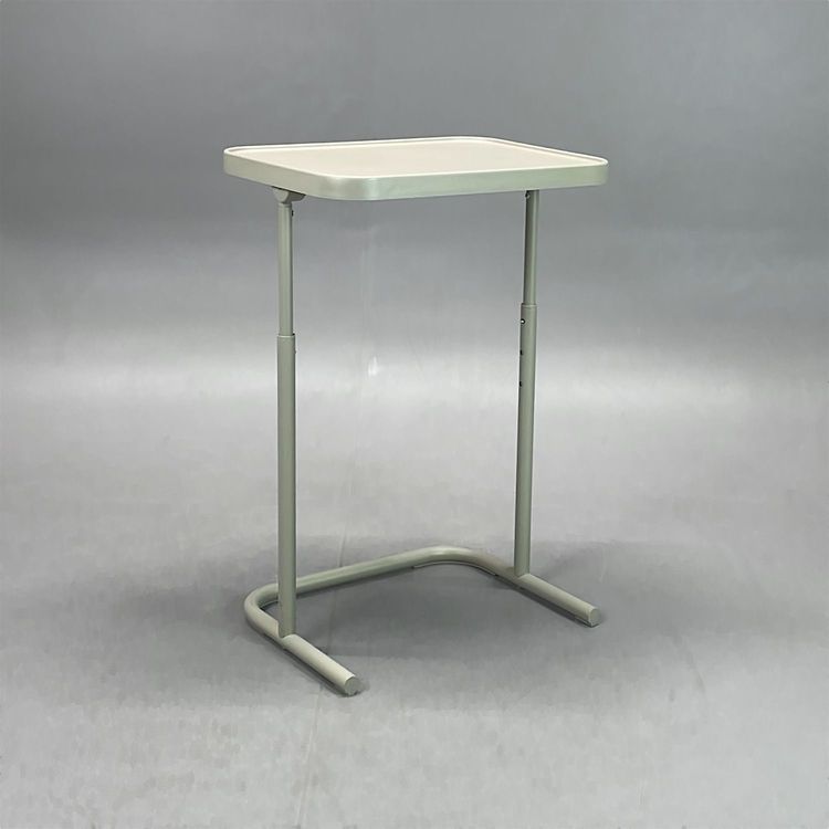 Begagnat laptopbord Björkåsen från Ikea i beige. Mått: bredd 46 cm, djup 35 cm och justerbar höjd mellan 60 till 70 cm. 