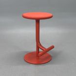 Begagnad barstol Tibu från Magis i orange med klädd tygsits. Mått: Justerbar sitthöjd 60–77 cm och diameter 37 cm.