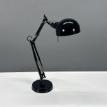 Begagnad IKEA Forså skrivbordslampa i svart med justerbar arm och skärm. Höjd 35 cm, fotens diameter 15 cm, skärmens diameter 12 cm. 