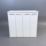 Begagnad vit miljösortering från Trece med 4 dörrar och 2 fack. Mått: bredd 125 cm, djup 60 cm och höjd 117 cm. 