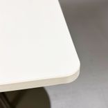 Begagnat cafébord Cone från Edsbyn med gråbeige bordsskiva och brunt pelarstativ. Mått: bredd 70 cm, djup 70 cm, höjd 72 cm. 