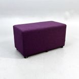 Begagnad sittpuff Bull från Johanson Design i lila. Mått: bredd 80 cm, djup 42 cm och höjd 44 cm. 