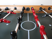 Begagnat fotbollsspel Soccer Table Deluxe från MP-Sport i ek med svarta ben. Mått: Bredd: 150 cm, Djup: 135 cm, Höjd: 83 cm.
