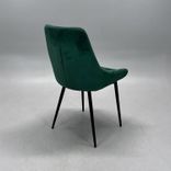 Begagnad konferensstol med grön sammetsklädsel, svarta ben och skålformad sits och rygg. Mått: Bredd 48 cm, djup 45 cm, höjd 86 cm och sitthöjd 47 cm. 