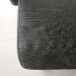 Begagnad kontorsstol Volmar från IKEA i svart och mörkgrått med justerbara armstöd, nackstöd, låsbar gunga. Mått: sitthöjd på 40–54 cm. 