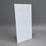 Begagnad glastavla från Lintex i vitt. Mått: bredd 75 cm och höjd 150 cm. 