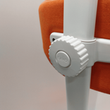 Begagnad kontorsstol Spine från Savo i orange tyg. Mått: sitthöjd mellan 42,5-52 cm. 