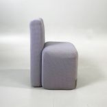 Begagnad lila stol, med dolda hjul från Viccarbe, modell Season. Klädd i strukturerat tyg. Mått: Bredd 52,5 cm, Djup 56 cm, Höjd 80 cm. 