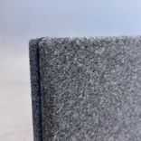 Begagnad bordsskärm Limbus från Glimakra of Sweden. Klädd i mörkgrått tyg med svart list. Mått: bredd 160 cm, höjd 50 cm, djup 4 cm. 