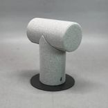 Begagnad pall Mr T från Materia klädd i ljusgrått tyg. Mått: bredd 39 cm, djup 35 cm och höjd 48 cm. 