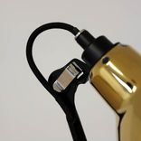 Begagnad bordslampa Lampe Gras N205 från DCW éditions i mässing med svart bas. Mått: Höjd: 65 cm, Lamphuvud: 14 cm i diameter, Fot: Ca 17 cm i diameter. 