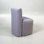 Begagnad lila stol, med dolda hjul från Viccarbe, modell Season. Klädd i strukturerat tyg. Mått: Bredd 52,5 cm, Djup 56 cm, Höjd 80 cm. 