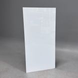 Begagnad glastavla från Lintex i vitt. Mått: bredd 75 cm och höjd 150 cm. 