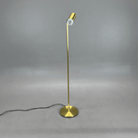 Begagnad golvlampa Cato Q från Belid i mässing. Mått: höjd 123 cm. 