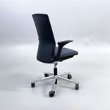 Begagnad kontorsstol Futu från HÅG med grå tygklädsel, aluminiumunderrede. Mått: Sitthöjd 40–55 cm. 