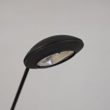 Begagnad skrivbordslampa Joker från Unilux i svart. Mått: Höjd 60 cm, fotens bredd 15 cm.