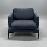 Begagnad fåtölj från Sits, modell Impulse, klädd i blågrått tyg. Mått: Bredd 85 cm, djup 90 cm och höjd 76 cm.