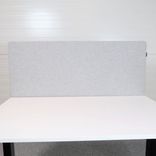 Begagnad bordsskärm från Edsbyn i ljusgrå färg. Mått: Bredd 120 cm, Djup 4 cm, Höjd 65 cm. 