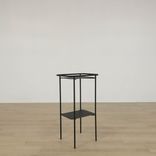 Begagnat svart soffbord från Norm Architects, modell Copenhagen Tray Table. Mått: Höjd: 89 cm, Bredd: 48 cm, Djup: 34 cm 