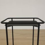Begagnat svart soffbord från Norm Architects, modell Copenhagen Tray Table. Mått: Höjd: 89 cm, Bredd: 48 cm, Djup: 34 cm 