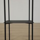 Begagnat svart soffbord från Norm Architects, modell Copenhagen Tray Table. Mått: Höjd: 89 cm, Bredd: 48 cm, Djup: 34 cm 