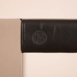 Begagnad Barstol från Tärnsjö Garveri klädd i svart garvat läder, stativ i trä/metall. Mått: höjd 64 cm, bredd 36 cm samt djup 36 cm.  