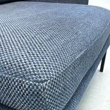 Begagnad fåtölj från Sits, modell Impulse, klädd i blågrått tyg. Mått: Bredd 85 cm, djup 90 cm och höjd 76 cm.